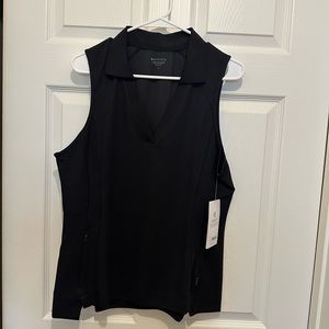 Black golf/tennis shirt.